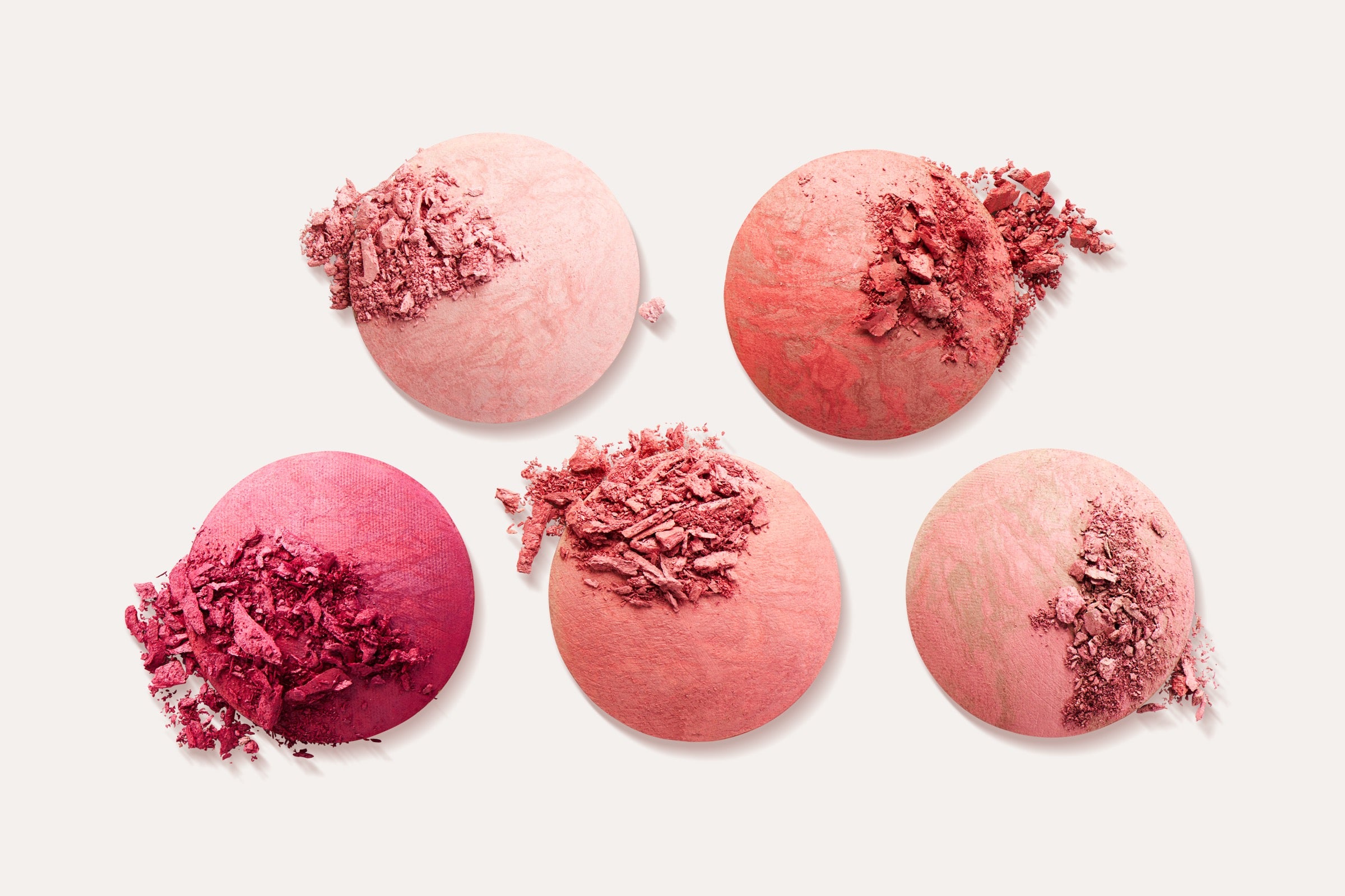 Ravie Beauty Endless Diffusion Baked Blush five-shade lineup arranged soft to saturated: Heaven, Daydream, Paradise, Hideaway, Oasis, compacts open showing the variegated marbled pans