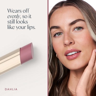 Wears off evenly, so it still looks like your lips. A model wearing it. Ravie Beauty Effortless Lips™ Sheer-Buildable Lip Color in Dahlia 