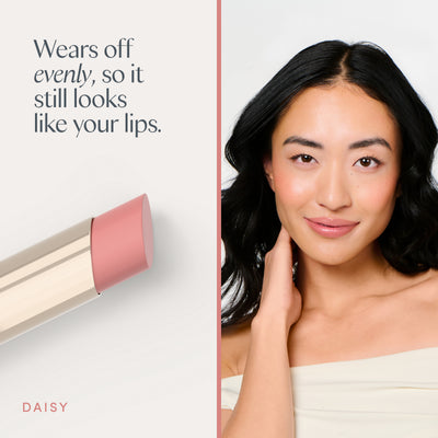 Wears off evenly, so it still looks like your lips. A model wearing it. Ravie Beauty Effortless Lips™ Sheer-Buildable Lip Color in Daisy 