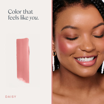 Color that feels like you. A model wearing it, and a swipe of the color. Ravie Beauty Effortless Lips™ Sheer-Buildable Lip Color in Daisy 