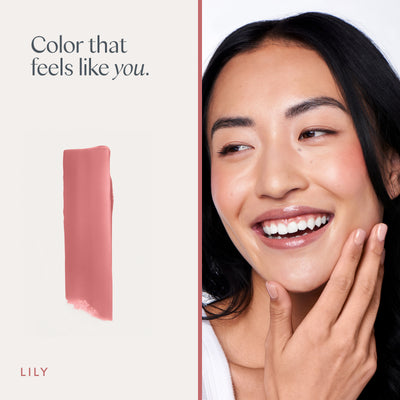 Color that feels like you. A model wearing it, and a swipe of the color. Ravie Beauty Effortless Lips™ Sheer-Buildable Lip Color in Lily 