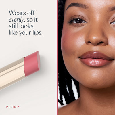 Wears off evenly, so it still looks like your lips. A model wearing it. Ravie Beauty Effortless Lips™ Sheer-Buildable Lip Color in Peony 