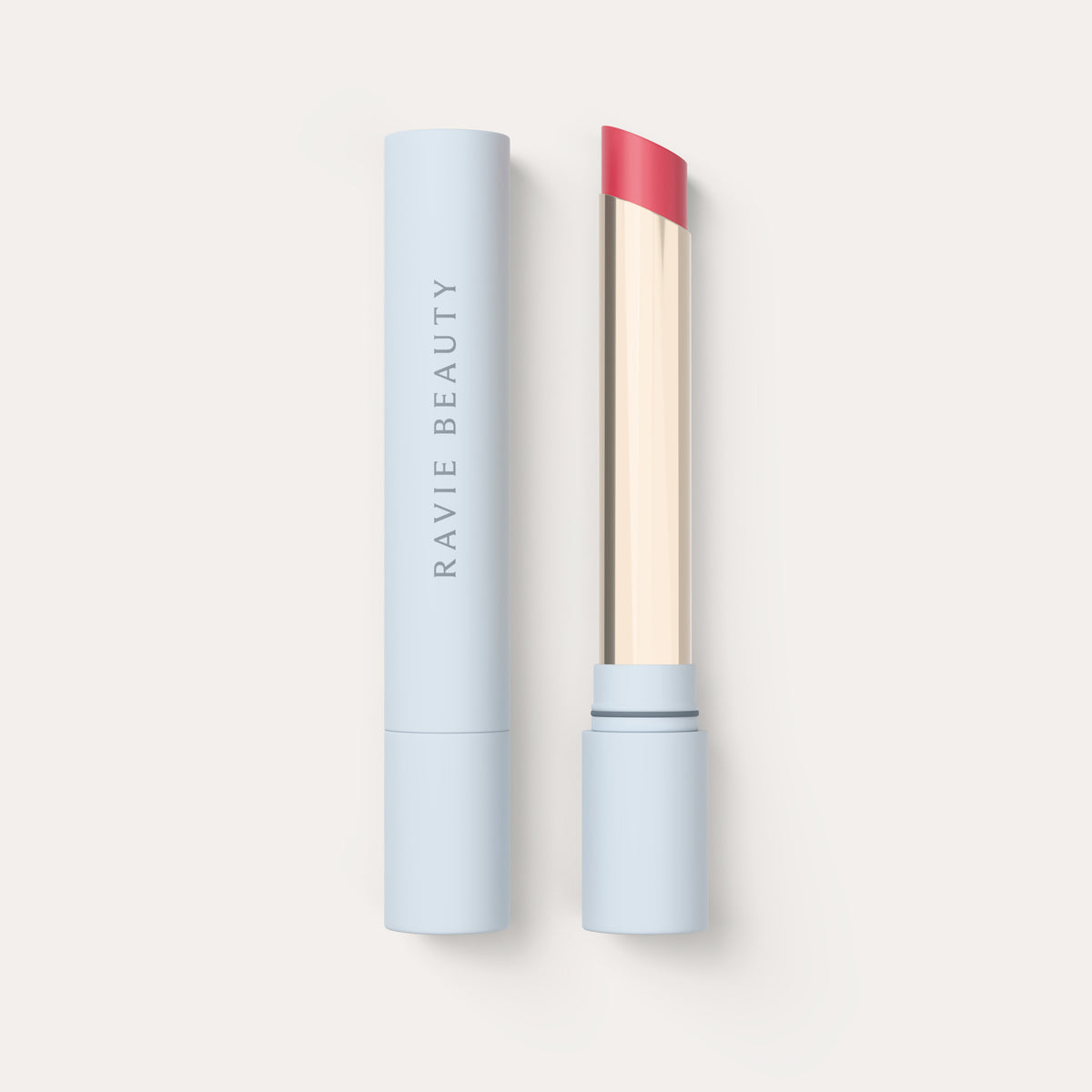 An open tube beside its cap. Ravie Beauty Effortless Lips™ Sheer-Buildable Lip Color in Tulip 