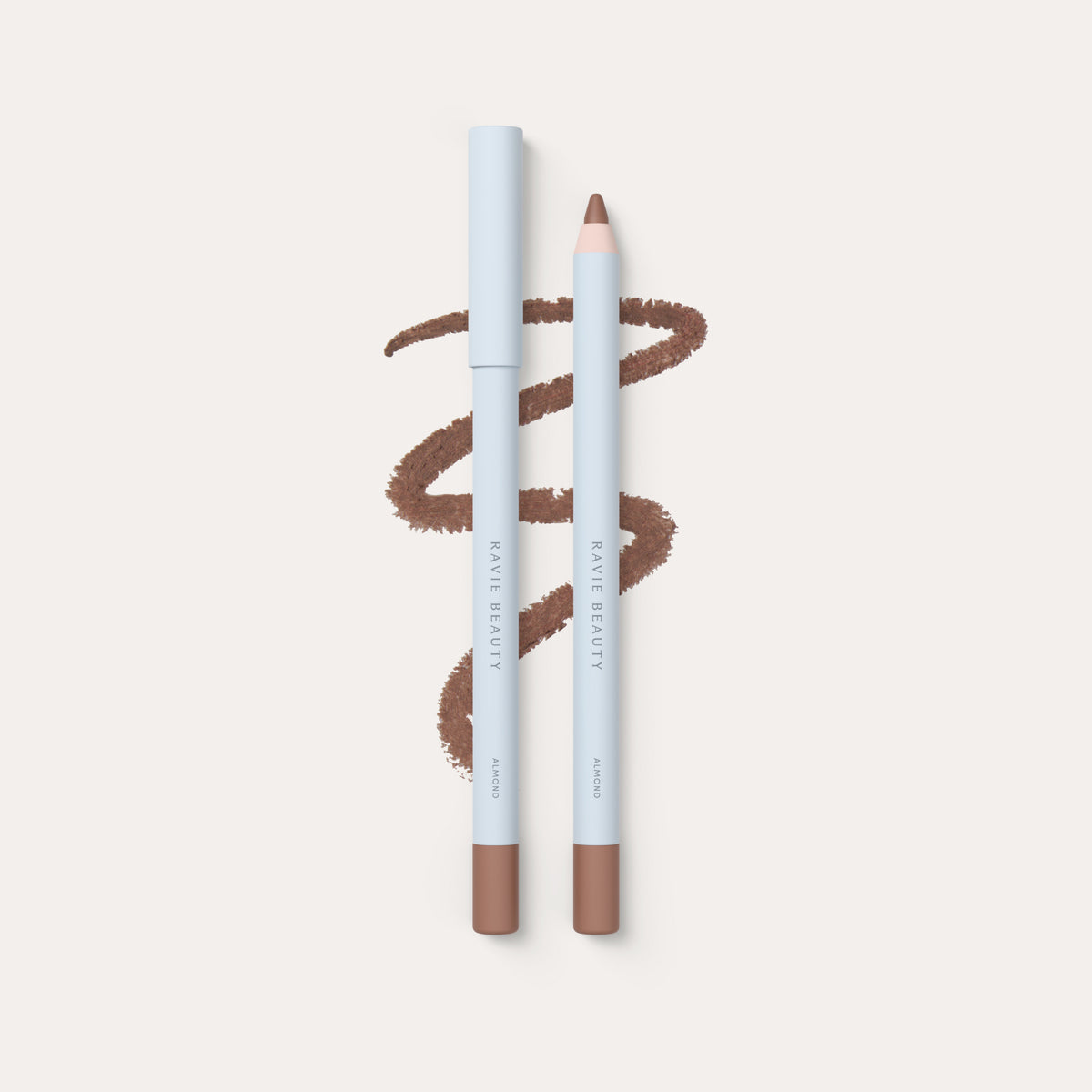 Two pencils and a swatch. Ravie Beauty Soft Definition™ Longwear Lip Liner in Almond 