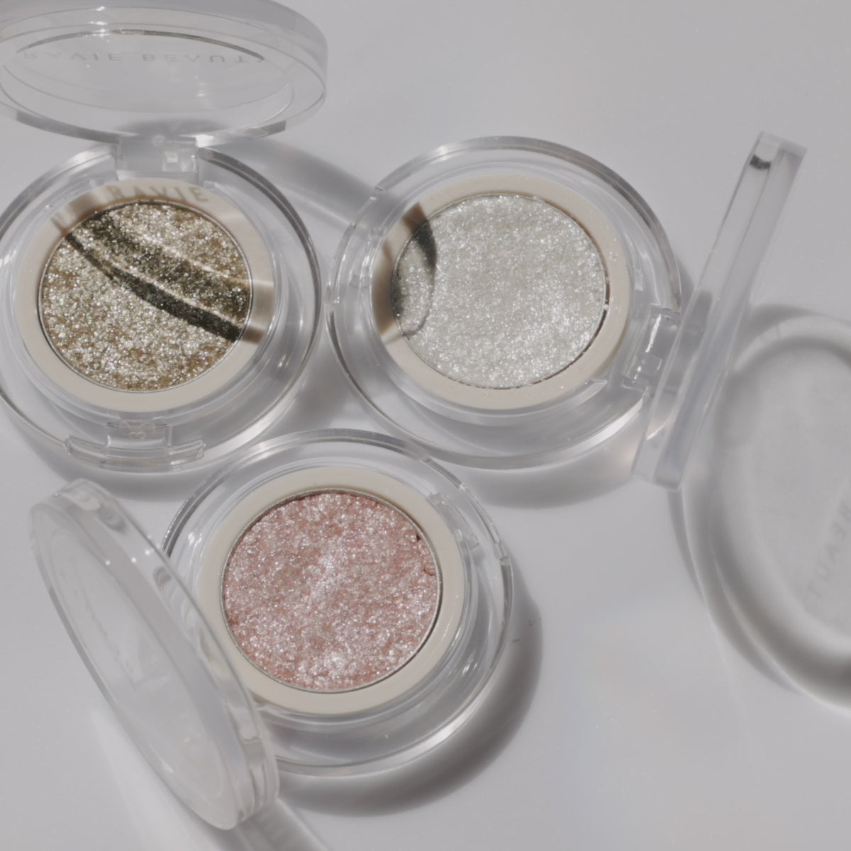 All three shades turning in the light. Ravie Beauty Softlight™ Glistening Eye Topper in Soft Gold 