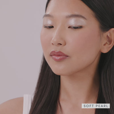 Models wearing it, and the sparkle catching the light. Ravie Beauty Softlight™ Glistening Eye Topper in Soft Pearl 