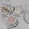 All three shades turning in the light. Ravie Beauty Softlight™ Glistening Eye Topper in Soft Pink #color_soft-pink